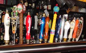 Taps at the Dinosaur Bar-B-Que include the house brew, made by Middle Ages Brewing of Syracuse, photo by Lucy Saunders